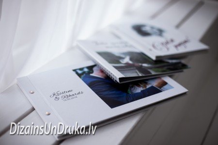 IMG_8264-1 Wedding photo book and other personalized albums placed on a windowsill