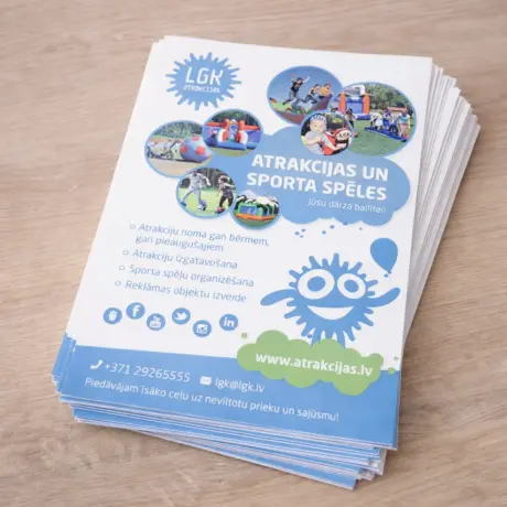 Skrejlapu drukas paraugs ar LGK atrakciju un sporta spēļu reklāmu