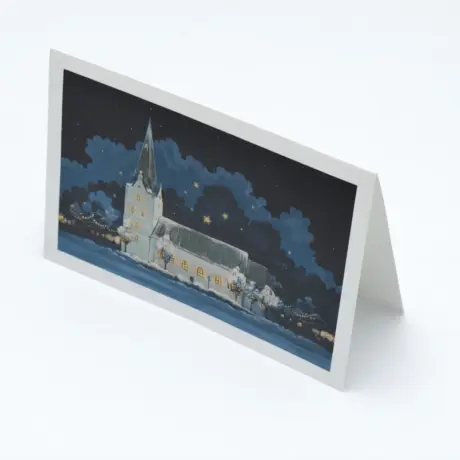 Apsveikuma kartīšu drukas paraugs ar ziemas ainavu un baznīcu