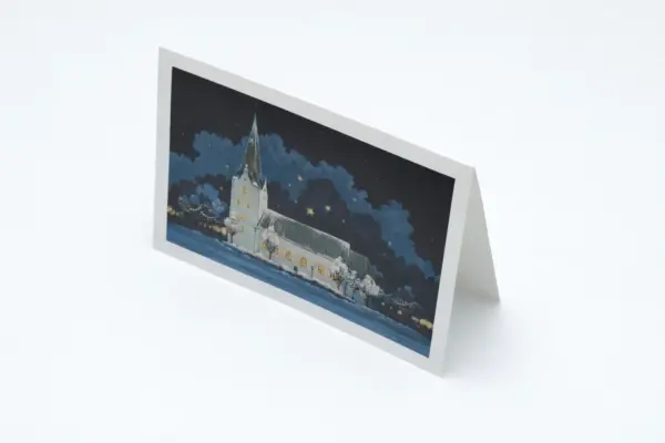 Apsveikuma kartīšu drukas paraugs ar ziemas ainavu un baznīcu