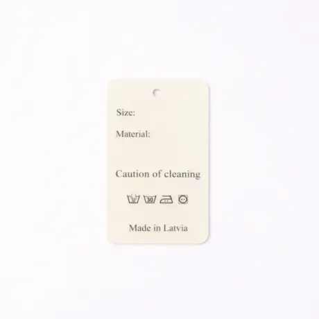 Custom hang tag printing on cardboard clothing tag with care symbols and Made in Latvia