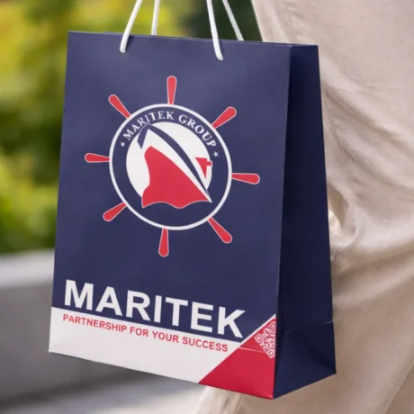 Dark blue custom gift bag with print and cord handles