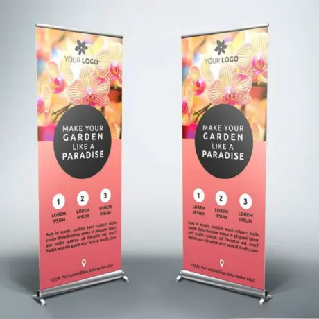 Two custom roll-up stands with bright floral print and aluminum frame